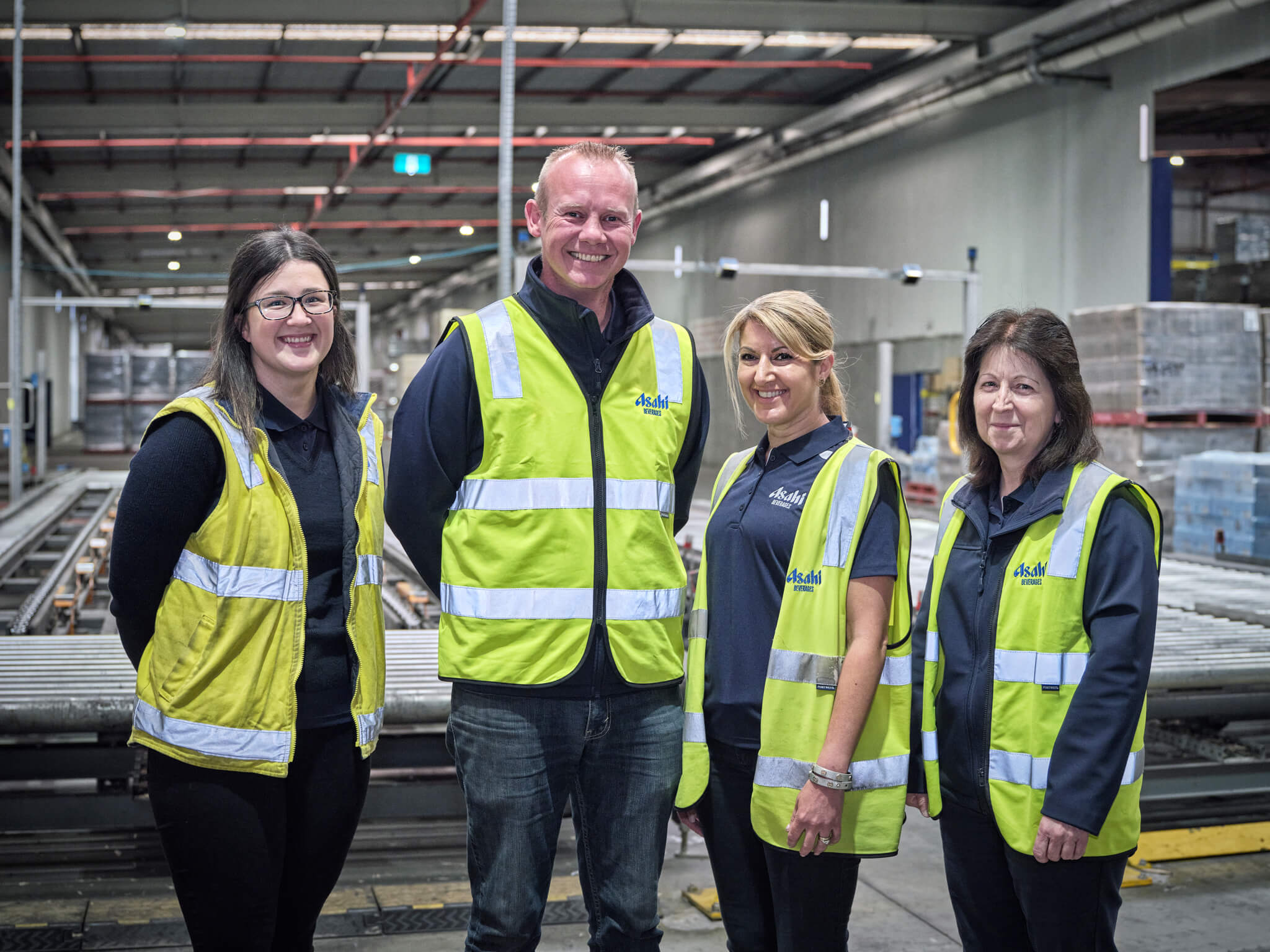 Asahi Global Procurement team members in a factory